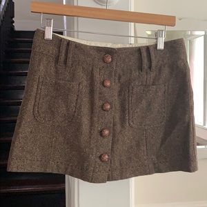 Button up tweed mini skirt with leather buttons